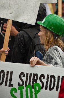 A protestor at the Toronto G20 summit calling for an end to oil subsidies 