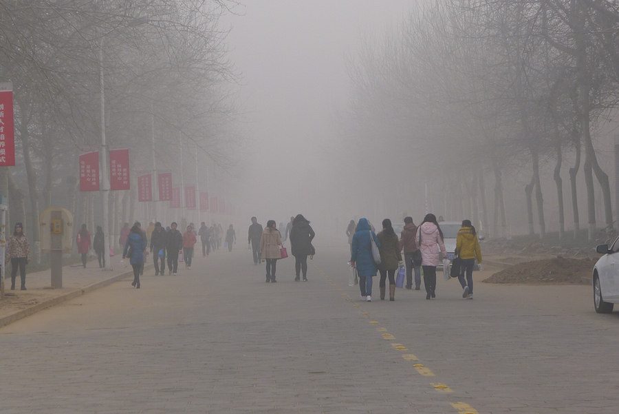 University students at Anyang Normal University, Christmas Day, 2013, Henan Province, China. Cognitive impacts air pollution.